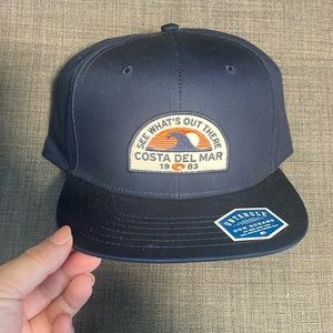 Brand new with tag, navy CostaDel Mar snapback hat